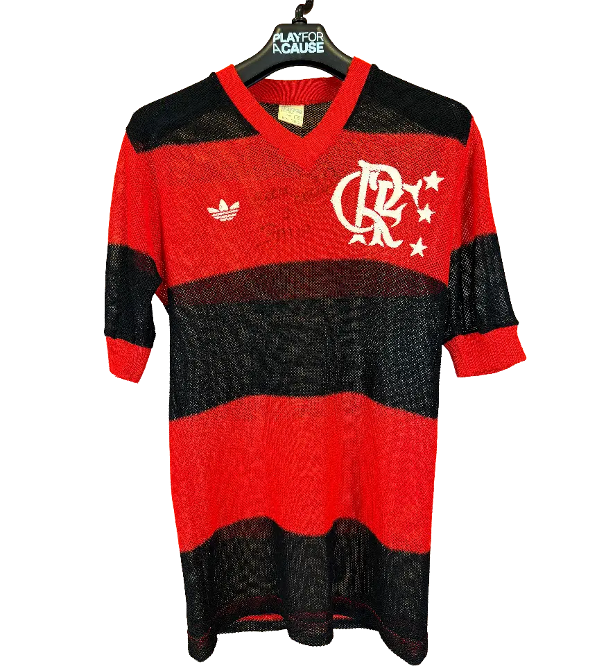 announcements/29e1172f-a721-4985-94ab-c38ae6d695b9/1792778952911-camisa-flamengo-sn-libertadores-1981-autografada-1.webp